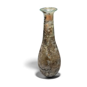 A Roman Pale Green Glass Unguentarium
