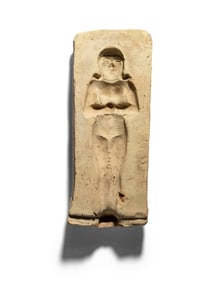 A Mesopotamian Terracotta Mold of a Nude Female