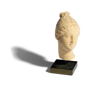 A Greek Terracotta Head of a Woman