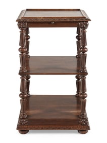 A Continental Carved Oak Etagere
