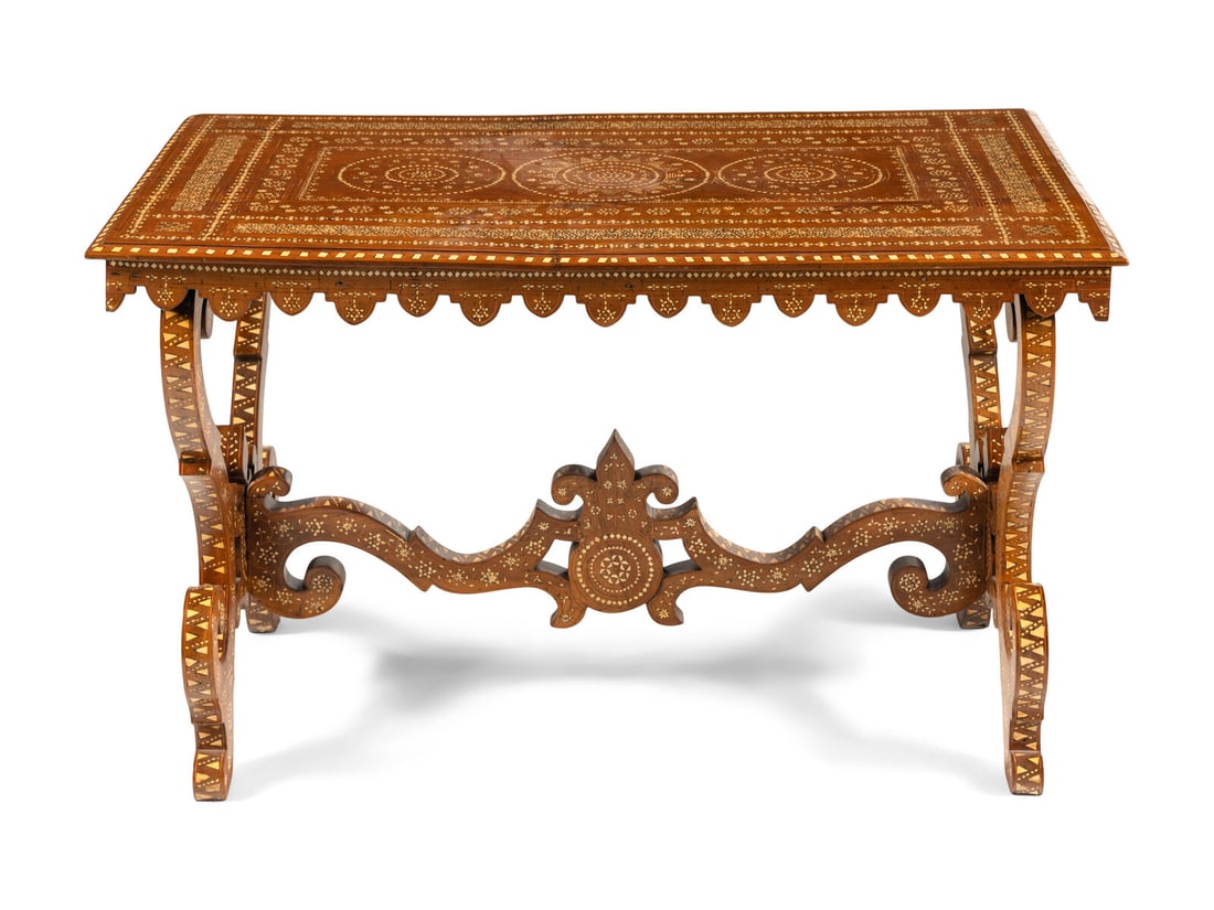 A North Italian Bone-Inlaid Walnut Table: A North Italian Bone-Inlaid Walnut Table Milan, 19th Century Height 30 3/8 x width 50 x depth 28 7/8 inches. This lot is located in Chicago.