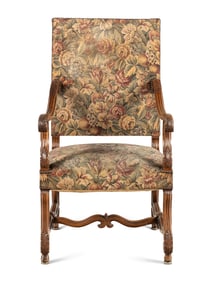 A Louis XIII Style Carved Walnut Armchair