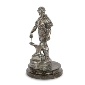 A Czech Silvered Metal Figure of a Blacksmith
