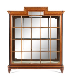 A Biedermeier Style Walnut and Parcel Ebonized Vitrine Cabinet