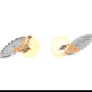 YELLOW GOLD WATCH CUFFLINKS: YELLOW GOLD WATCH CUFFLINKS One cufflink monogrammed 'HDC', the other with a manual wind watch. 14 karat yellow gold. 11/16 inch wide. Stamp: 14K. Gross weight: 10.45 dwt. Property from the Private Co