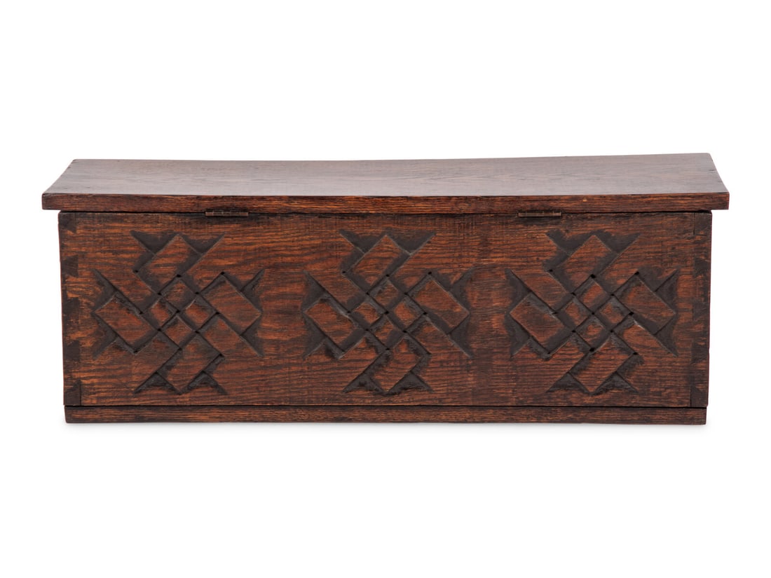 A Carved Oak Table Casket: A Carved Oak Table Casket Early 20th Century Height 7 1/4 x width 20 1/2 x depth 7 1/4 inches. Property from the Estate of James G. Hansen at Fetcher House, Winnetka, Illinois This lot is located in C