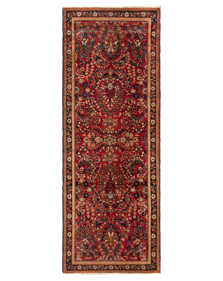 A Sarouk Rug: A Sarouk Rug Second Quarter 20th Century 6 feet 6 inches x 2 feet 5 1/2 inches. Property from the Estate of James G. Hansen at Fetcher House, Winnetka, Illinois This lot is located in Chicago. The Fet