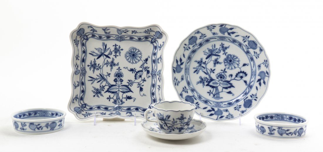 A Group of Six Meissen Porcelain Dining Articles, Diame: A Group of Six Meissen Porcelain Dining Articles, in the Blue Onion pattern, comprising a dinner plate, a platter, two wine coasters, a teacup and saucer, each having crossed swords in underglaze blue