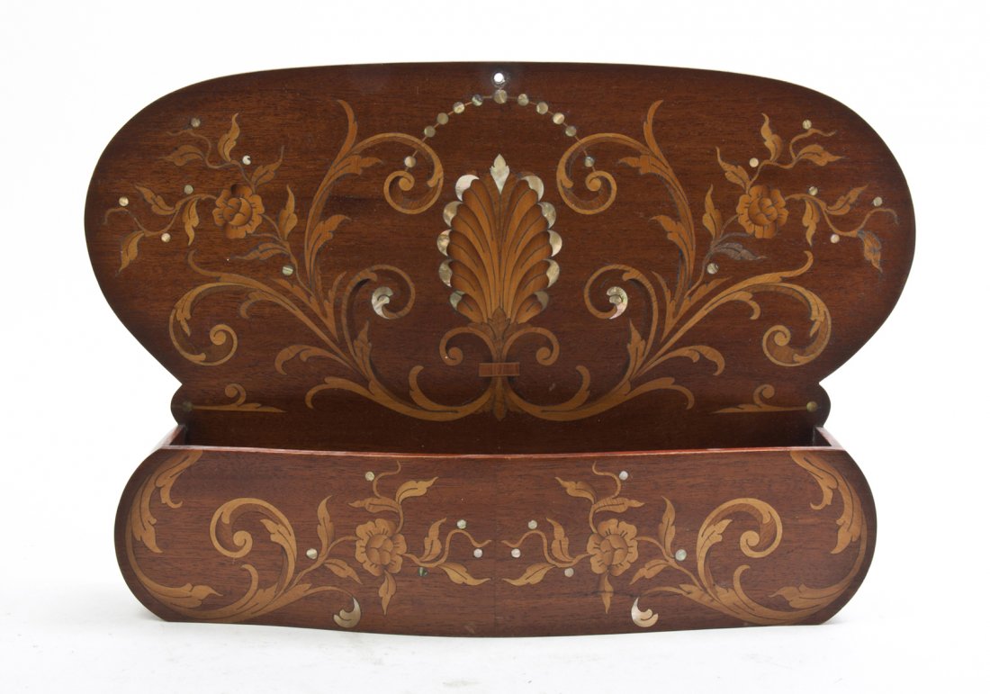 A Marquetry Decorated Wall Pocket, Width 14 5/8 inches.: A Marquetry Decorated Wall Pocket, of oval form with foliate and shell decoration. Width 14 5/8 inches. Property from the Estate of Mr. Mark Fritz, West Bloomfield, Michigan