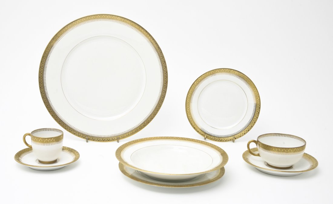 A Limoges Partial Dinner Service, Diameter of dinner pl: A Limoges Partial Dinner Service, comprising 10 dinner plates, 14 bowls, 9 bread plates, 11 salad plates, 14 cups and 23 saucers; 81 items total. Diameter of dinner plate 10 3/8 inches.