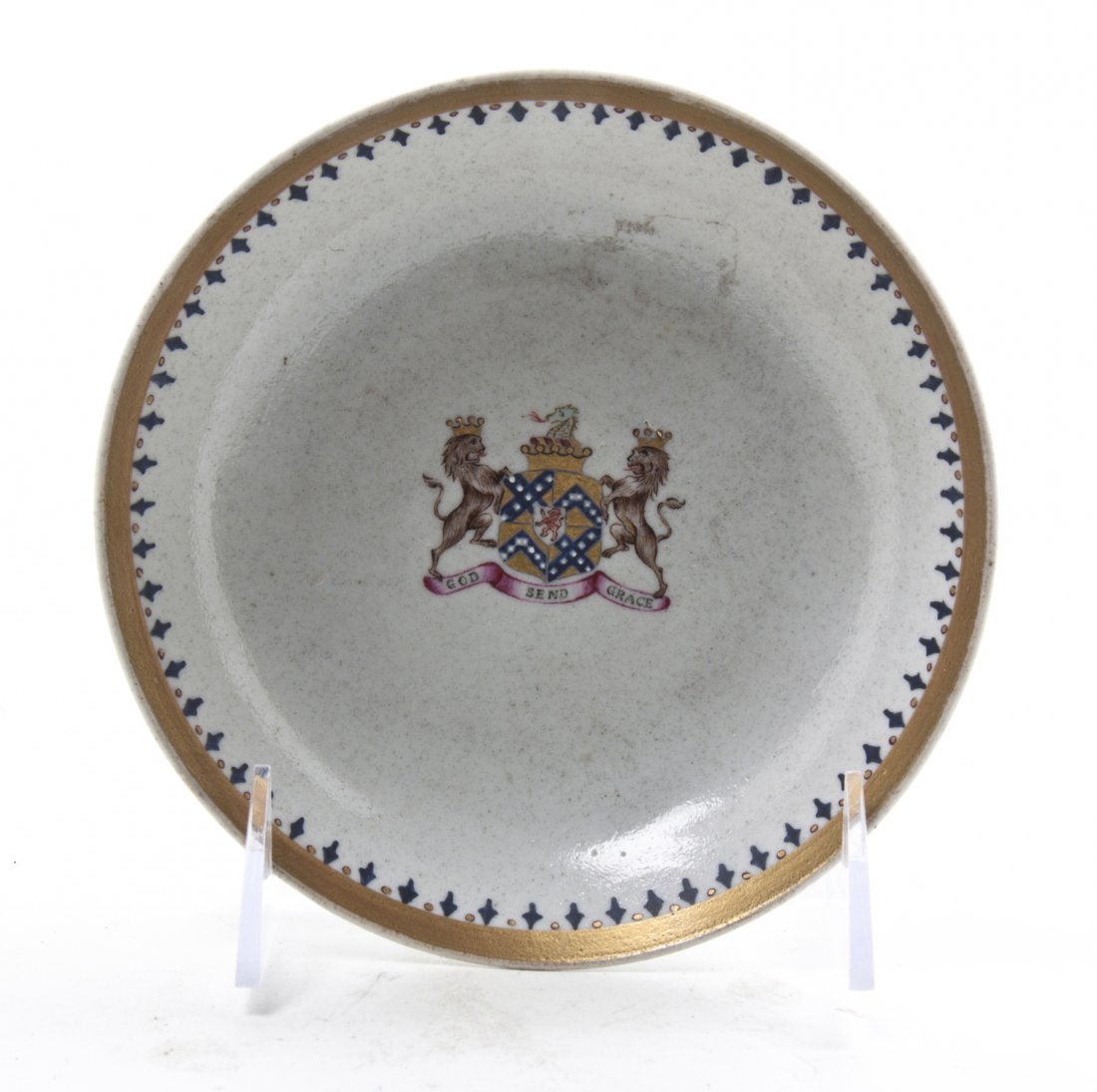 A Chinese Export Armorial Porcelain Bowl, Diameter 5 5/: A Chinese Export Armorial Porcelain Bowl, having a central crest, bearing a dragon's head breathing fire within a crown, over a shield flanked by crowned lions, above the motto GOD SEND GRACE. Diamete
