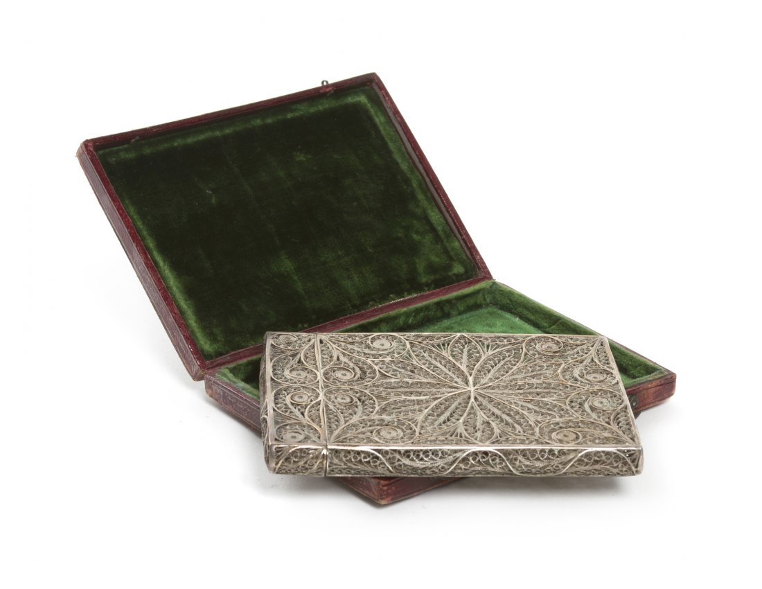 A Silver Filigree Card Case, Height 3 1/4 inches.: A Silver Filigree Card Case, having a fitted leather external case. Height 3 1/4 inches. Property from the Estate of Mr. Mark Fritz, West Bloomfield, Michigan