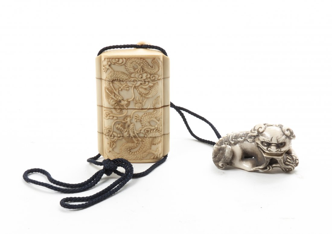 A Japanese Ivory Inro, Height 2 3/4 inches.: A Japanese Ivory Inro, of four section form, having dragon decoration, set with shishi lion form carved ivory netsuke, signed Matsuyama. Height 2 3/4 inches. Property from the Collection of Dr. and Mr