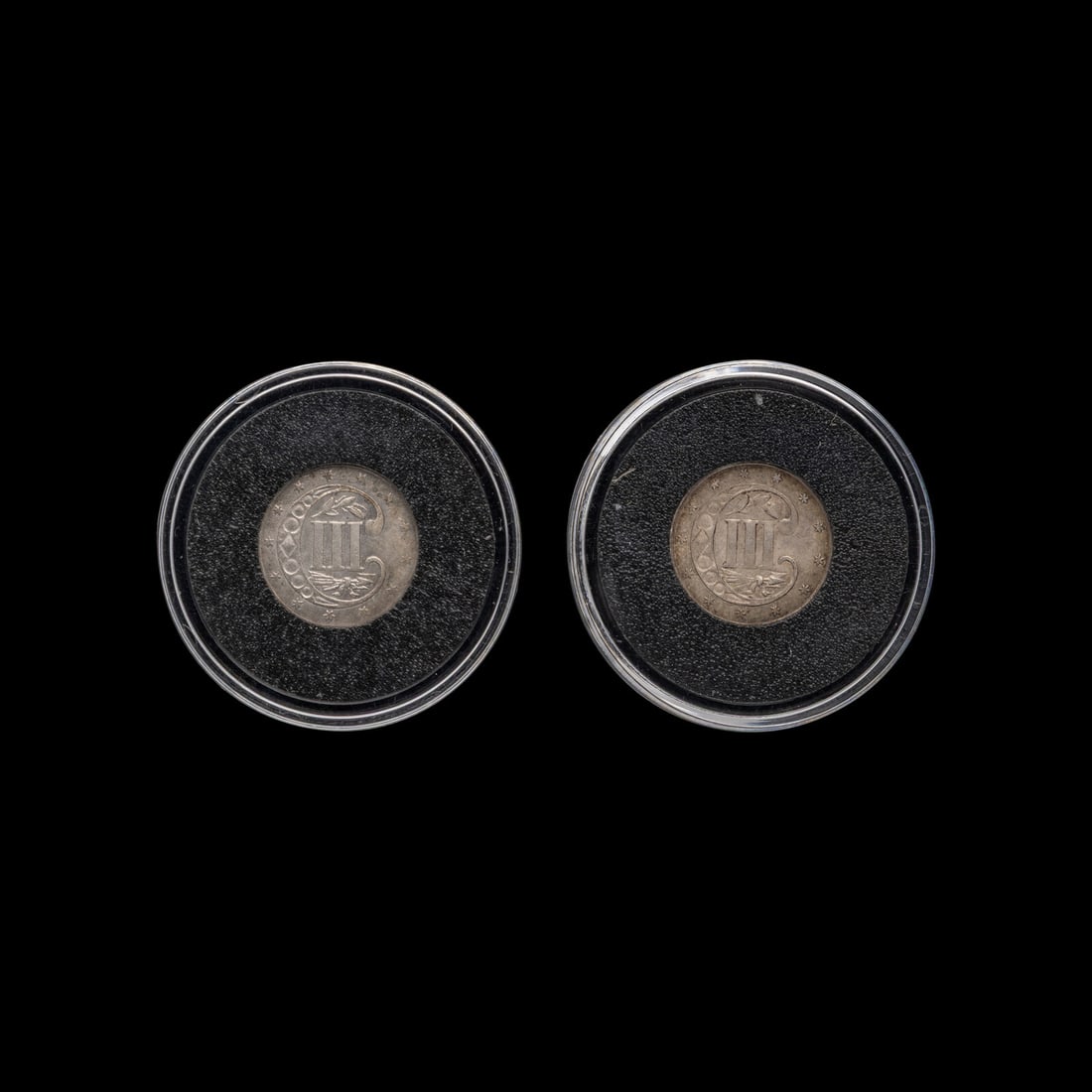 An 1857 and 1862 3c Silver Coin; two coins total (1 of 2)