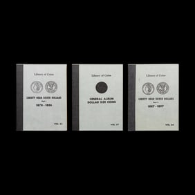 A Collection of Seventy Morgan Silver Dollars