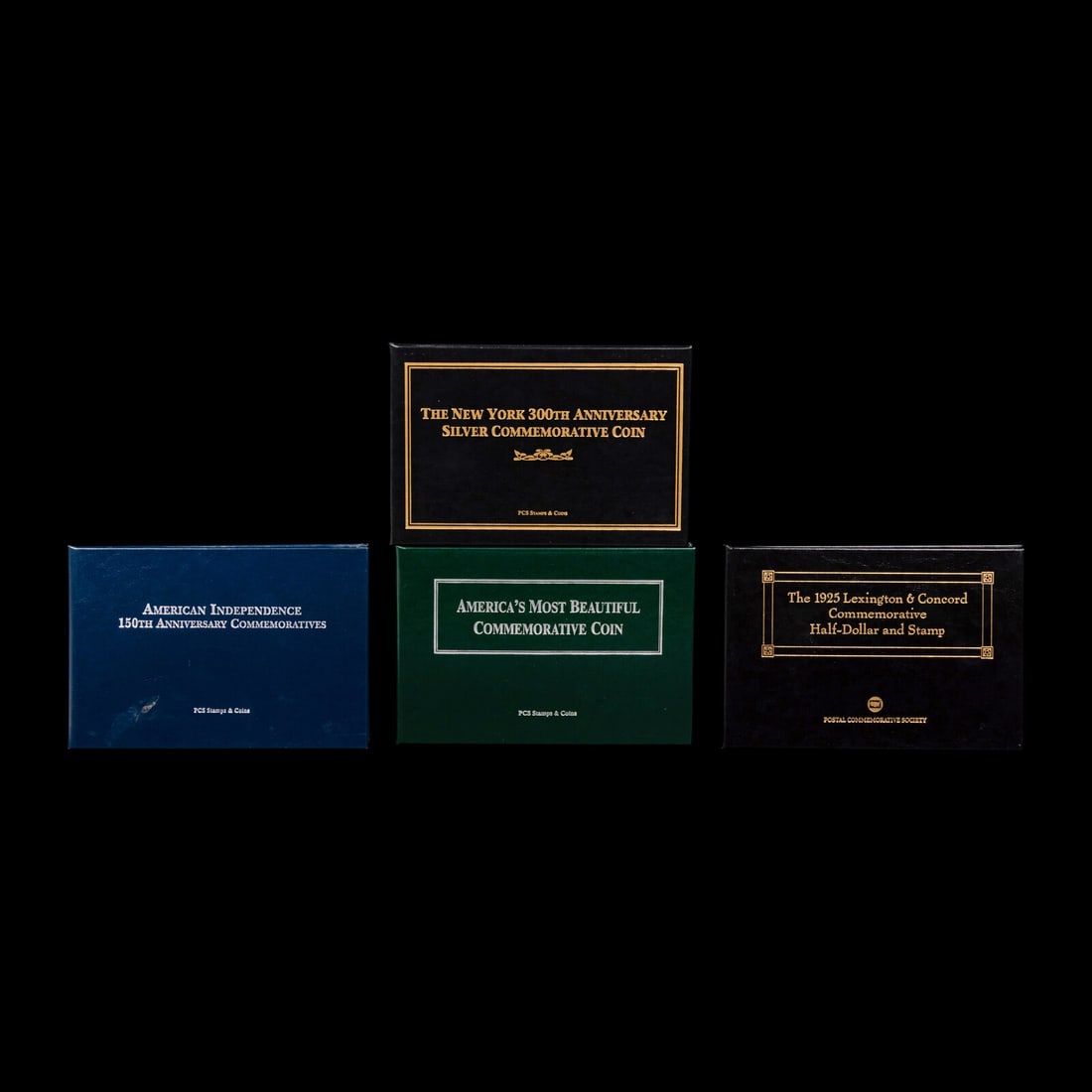 A Group of Four Commemorative 50c Coin and Stamp Sets (1 of 5)