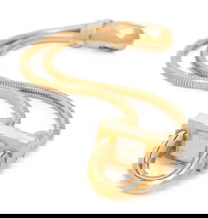 VAN CLEEF & ARPELS, YELLOW GOLD 'CADENAS' WATCH: VAN CLEEF & ARPELS, YELLOW GOLD 'CADENAS' WATCH The surrealist padlock-shaped case measuring approximately 26 x 14 x 13 mm with silvered dial and quartz movement, double integrated snake chain bra