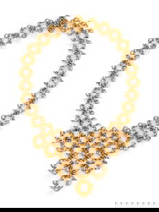 FRENCH, YELLOW GOLD BIB NECKLACE: FRENCH, YELLOW GOLD BIB NECKLACE The fancy links forming a bib. 18 karat yellow gold. 14 3/4 inches long. Stamp: FRANCE 18K (maker's mark) 750. Gross weight: 61.80 dwt.