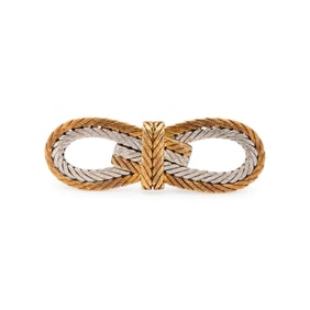 BUCCELLATI, BICOLOR GOLD KNOT BROOCH