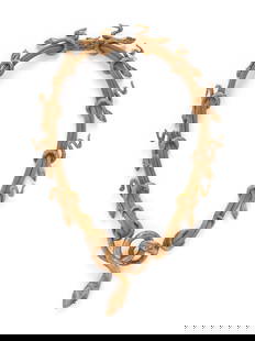 ILIAS LALAOUNIS, YELLOW GOLD AND RUBY SERPENT NECKLACE: ILIAS LALAOUNIS, YELLOW GOLD AND RUBY SERPENT NECKLACE The twin gold mesh necklace, intricately entwined with graduating serpents, the largest with bezel-set round ruby eyes. 18 karat yellow gold. 21