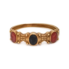 YELLOW GOLD AND HARDSTONE INTAGLIO BANGLE BRACELET