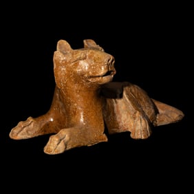 A Chinese Straw Glazed Pottery Figure of a Recumbent Dog, Han Dynasty 漢 陶臥ĥ