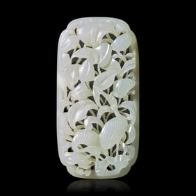 A Chinese Pale Celadon Jade 'Cranes and Peaches' Reticulated Plaque, 19th Century or Earlier 清