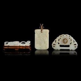 Three Chinese Yellow and White Jade Pendants, Late 19th-20th Century 晚清-民ࢴ