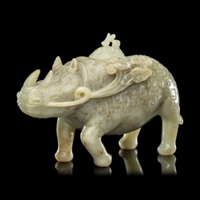 A Chinese Carved Celadon Jade Archaistic Rhinoceros-Form Covered Vessel, 20th Century 近ߣ
