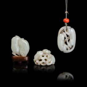 Three Chinese White and Pale Celadon Jade Pendants, 19th-Early 20th Century 晚清-民