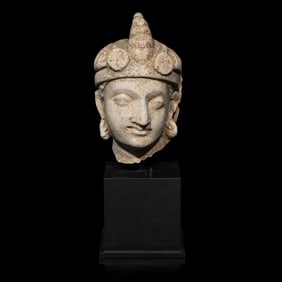 A Gandharan Stucco Head of Maitreya, Hadda Region, 4th/5th Century