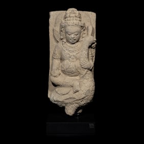 An Indonesian Volcanic Stone Figure of Kumara, Central Java, 10th Century