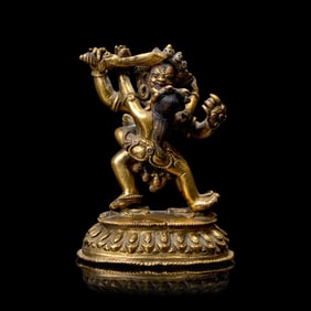 A Small Sino-Tibetan Gilt Bronze Figure of a Mahakala and Shakti 銅鎏金大