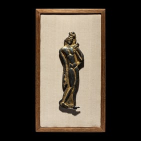 A Thai Parcel Gilt Bronze Relief of a Walking Buddha, 16th-17th Century