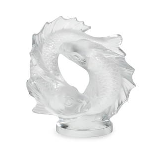 A Lalique Deux Poissons Sculpture: A Lalique Deux Poissons Sculpture 20th Century designed by Marc Lalique, 1953; the base signed in etch Lalique (c) France. Height 11 1/4 inches. This lot is located in Palm Beach.