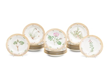 A Set of Nineteen Royal Copenhagen Flora Danica Porcelain Bread Plates
