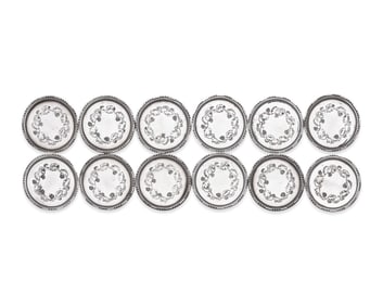 A Set of Twelve Georg Jensen Silver Coasters