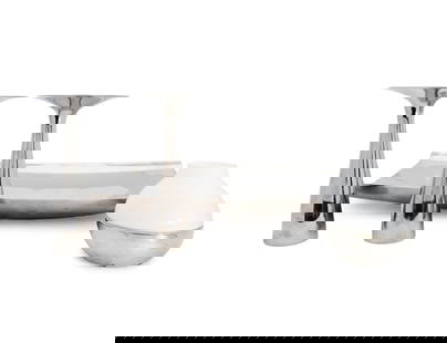 Seven Georg Jensen Stainless Steel Table Articles: Seven Georg Jensen Stainless Steel Table Articles 20th/21st Century comprising two serving trays, a pair of candlesticks, a votive holder, a vase, and a center bowl; each marked Georg Jensen/Denmark t
