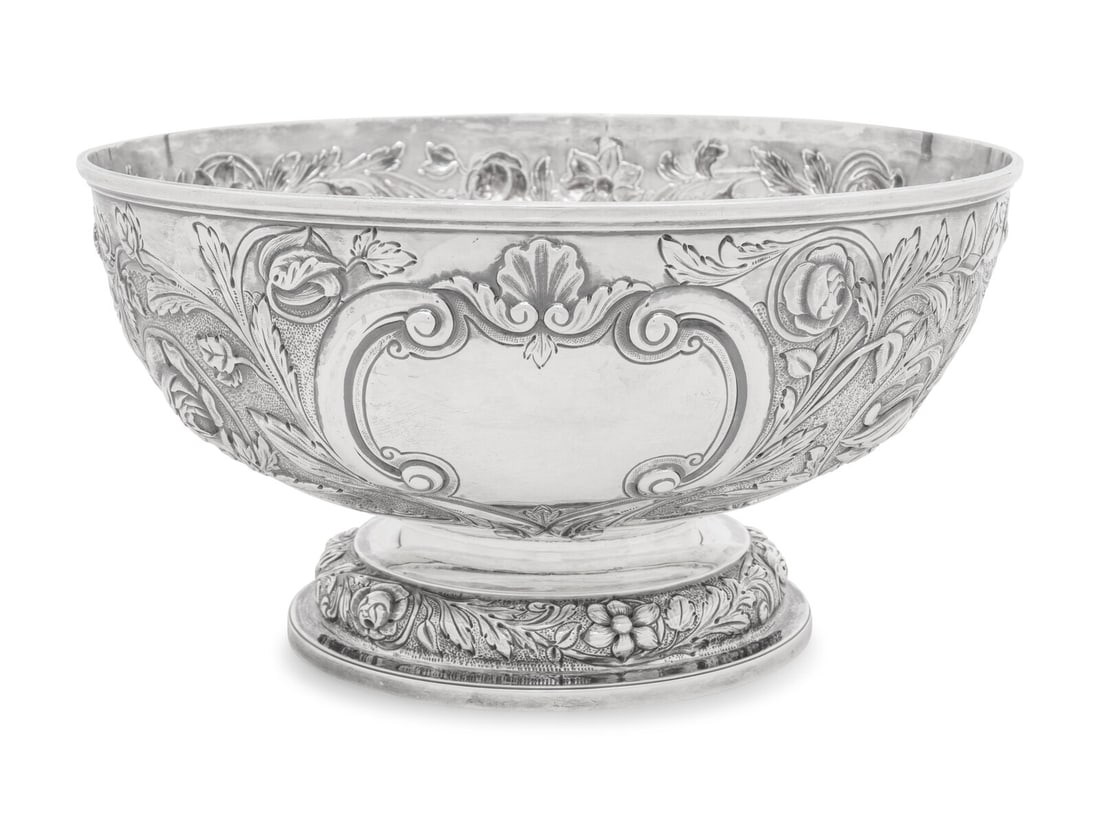 An English Silver Centerpiece Bowl: An English Silver Centerpiece Bowl Charles and Richard Comyns, London, 1926 hallmarked for Sterling to underside 41 ozt 15 dwt Height 6 1/2 x diameter 12 inches. This lot is located in Chicago.