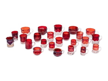 A Collection of Twenty-Four American Pressed Glass Mugs and Beakers