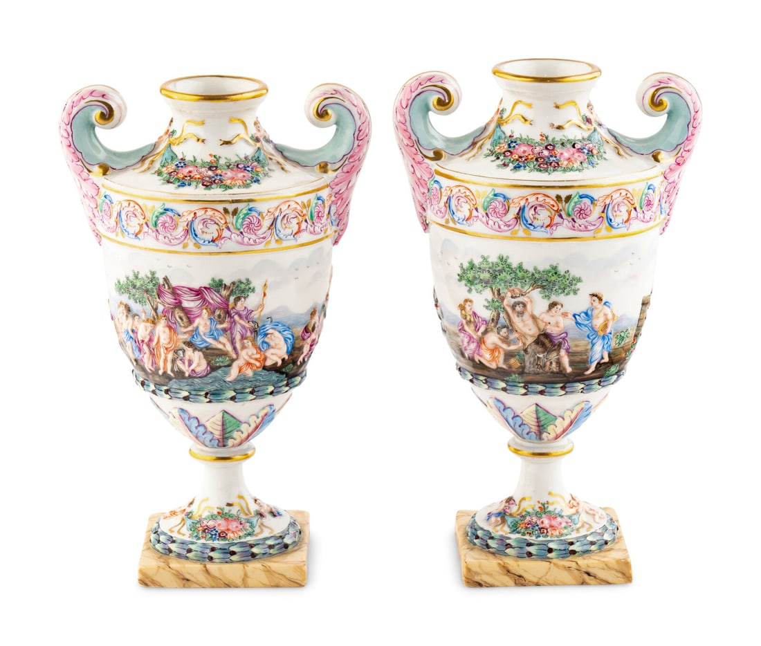 A Pair of Capodimonte Style Urns: A Pair of Capodimonte Style Urns 19th/20th Century Height 9 1/4 inches. This lot is located in Chicago.