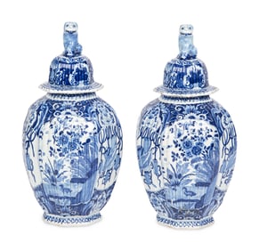 A Pair of Delft Blue and White Covered Jars