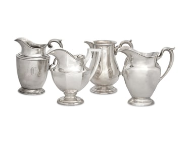 A Group of Four American Silver Water Pitchers