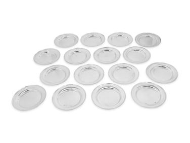 A Set of Sixteen American Silver Bread Plates