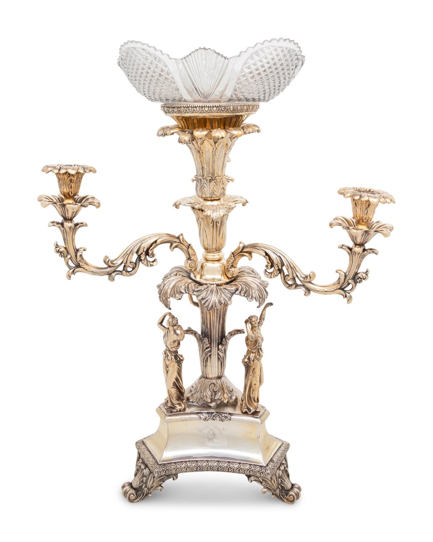 An English Silver-Plate and Cut-Glass Centerpiece: An English Silver-Plate and Cut-Glass Centerpiece 19th Century Overall height 26 inches. This lot is located in Chicago.