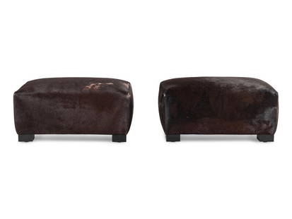 A Pair of Custom Upholstered Ottomans: A Pair of Custom Upholstered Ottomans with Edelman Cavallini cowhide upholstery. Height 17 x width 32 x depth 22 inches. This lot is located in Chicago. ProvenanceProvenance:Parenteau Studios,