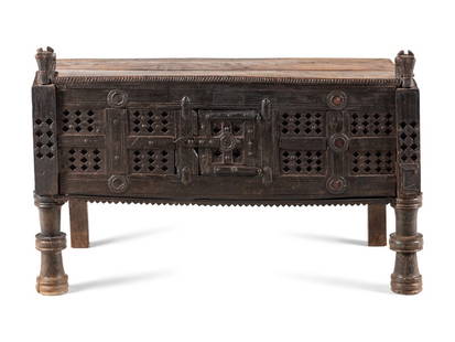 A Himalayan Carved Blanket Chest: A Himalayan Carved Blanket Chest Swat Valley, 19th Century Height 27 x width 40 x depth 22 inches. This lot is located in Chicago. 