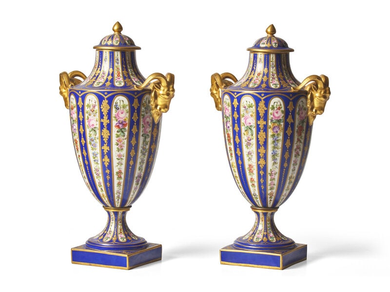 A Pair of Sevres Parcel Gilt, Cobalt and Garland Decorated Porcelain Lidded Urns (1 of 2)