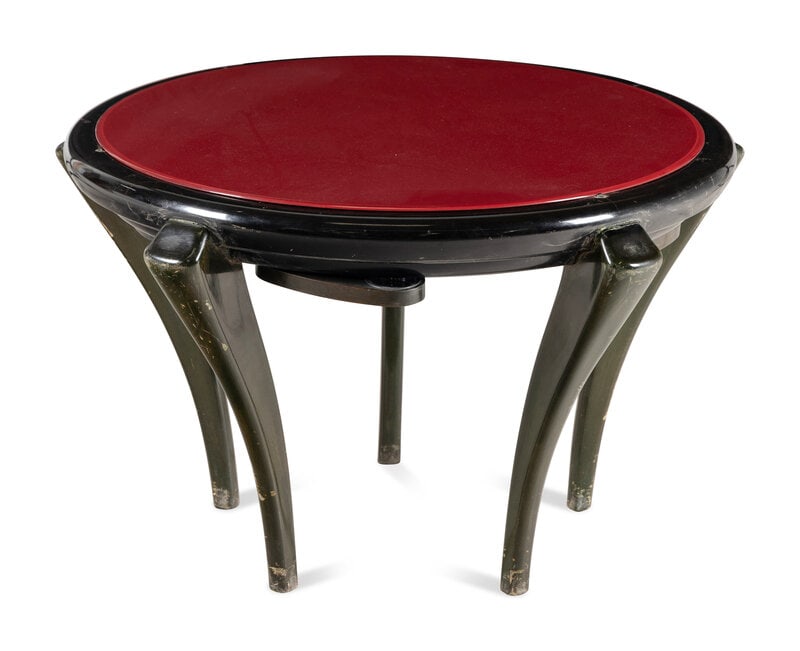 Vittorio Valabrega (Italian, 1861-1952): Vittorio Valabrega (Italian, 1861-1952) 20th Century low table with red glass top, green lacquer legs, and five retractable ashtrays. Height 22 1/2 x width 34 1/2 inches. Prop