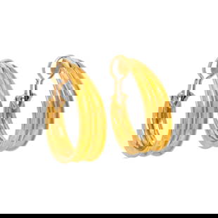 TIFFANY & CO., YELLOW GOLD HOOP EARRINGS: TIFFANY & CO., YELLOW GOLD HOOP EARRINGS Yellow gold. 1 1/4 inches long. Stamp: TIFFANY & CO. 18K. Gross weight: 9.55 dwt. Accompanied by Tiffany & Co. earring pouch.